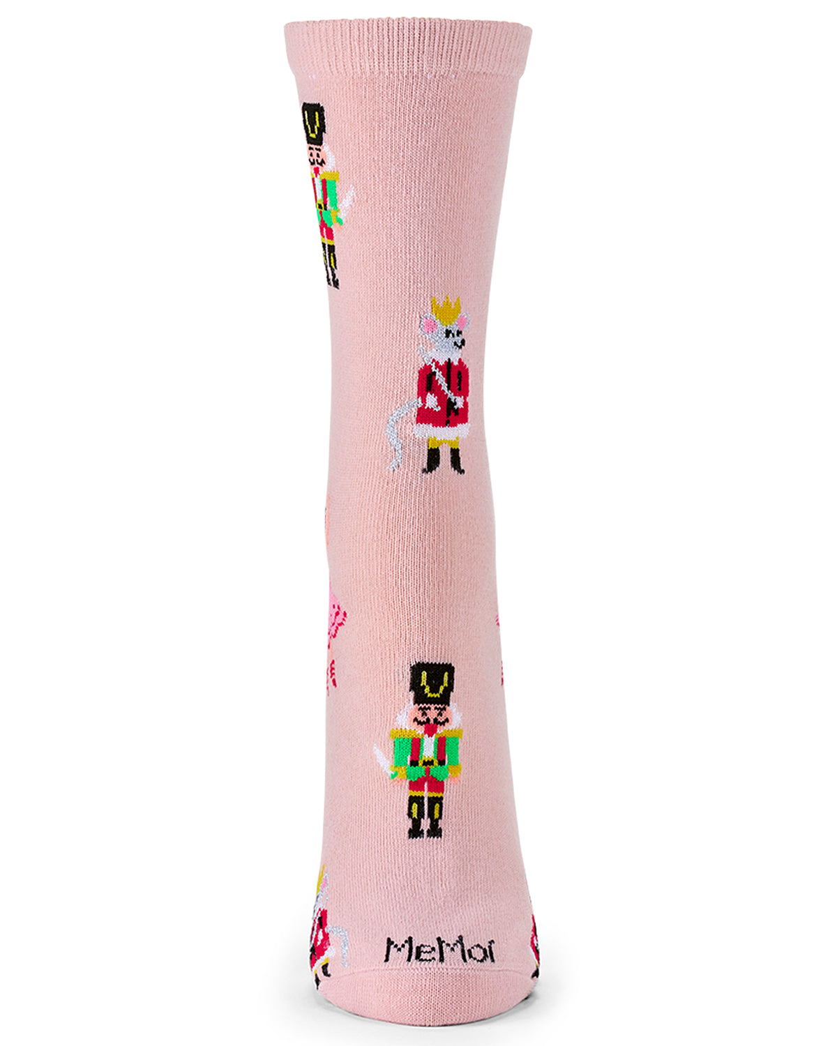A single light pink crew sock with a repeating pattern of colorful nutcracker and horse characters, featuring the text 'MeMoi' printed near the cuff, shown on a plain white background.