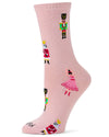 A single light pink crew sock with a knit pattern of cartoon toy soldiers, a ballerina, and a crowned king, shown on a white background.