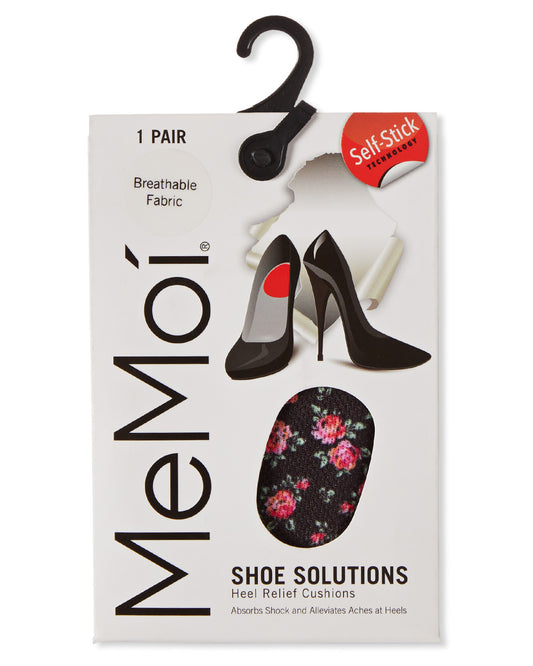 MeMoi Shoe Solutions heel relief cushion packaging, featuring a white box with a black hanger, illustrations of black high heels, and a floral cushion design on a white background.