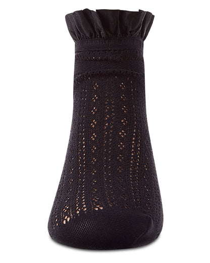 Black sock with textured pattern on a white background