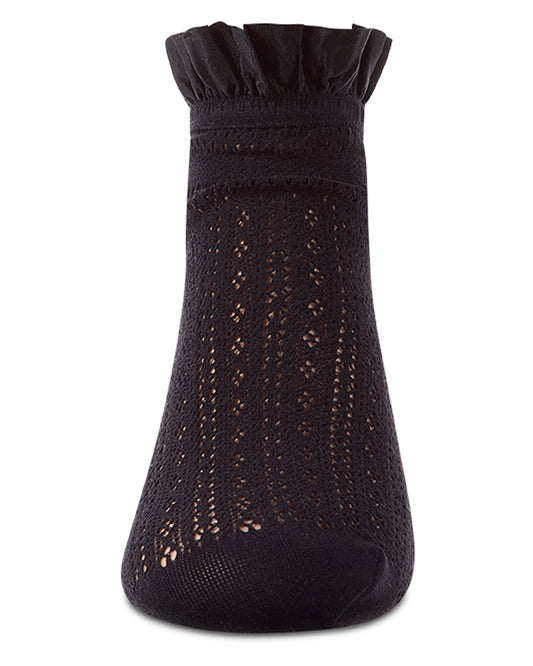 Black sock with textured pattern on a white background