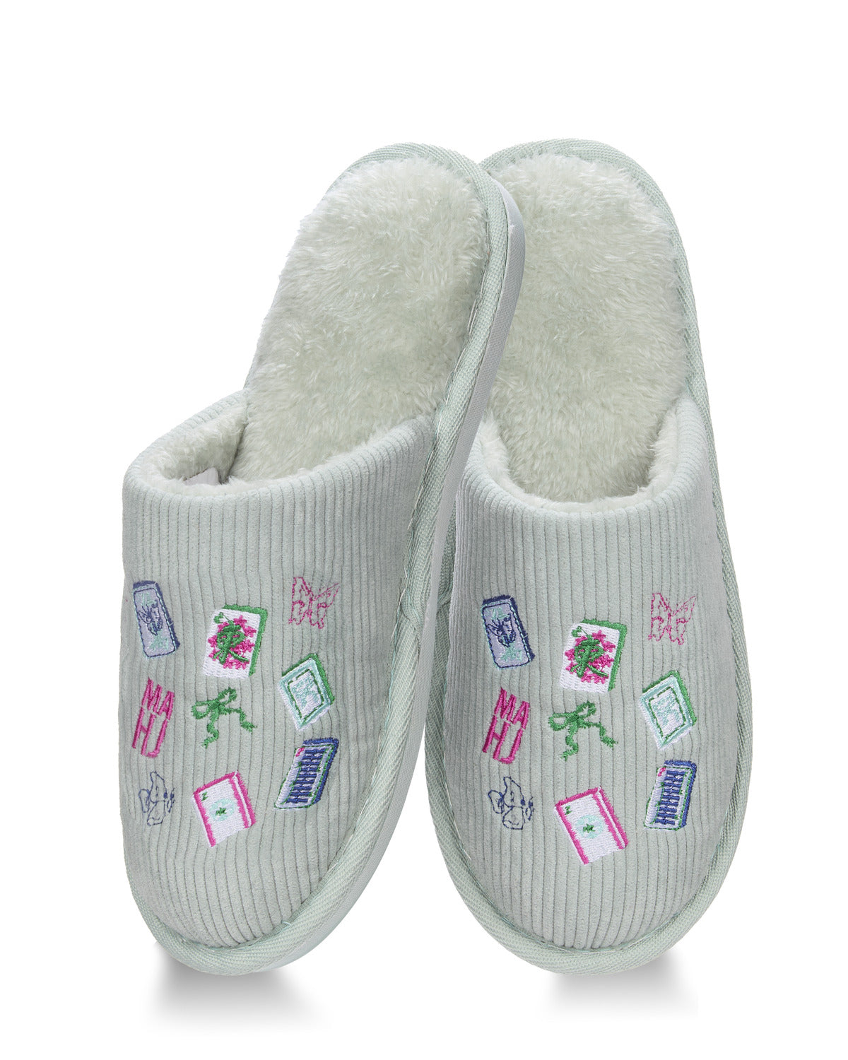 A pair of light gray ribbed corduroy slip-on slippers with a fluffy cream interior and colorful embroidered motifs on the upper.