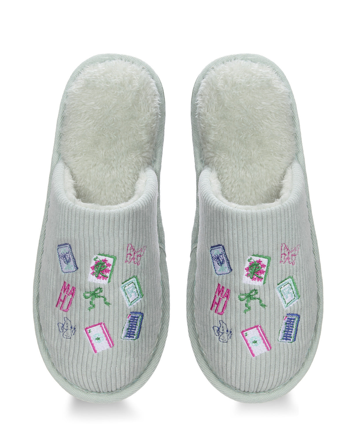 A pair of light gray ribbed slip-on slippers with a soft white fleece lining and colorful embroidered motifs including books, flowers, bows, and butterflies on the top.